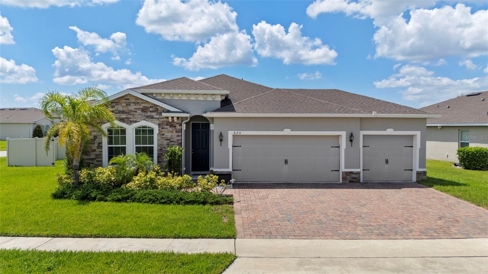 Built in 2018 and perfectly situated on an oversized premium corner lot, this home offers the ideal blend of luxury, functionality and location. Just minutes from SR-429, enjoy convenient access while tucked into a peaceful, desirable neighborhood. Step inside to discover a spacious, open-concept layout filled with builder upgrades galore. The heart of the home features a chef’s kitchen equipped with stainless-steel appliances, a gas range, and an oversized island with sleek countertops. All seamlessly flowing into the main living and dining areas - perfect for everyday living and entertaining. Enjoy ideal indoor-outdoor living with a fully fenced backyard that boasts a heated saltwater pool - your year round private retreat. Energy efficiency is a bonus with leased solar panels, and the 3-car garage offers extra space for storage, hobbies, or vehicles.