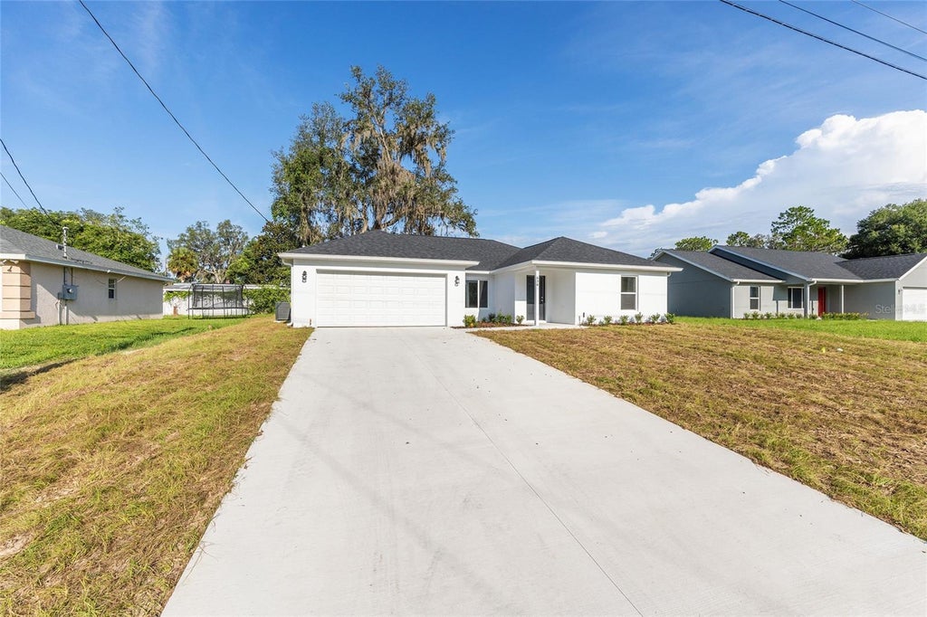 Photo of 636 NE 130th Court, Silver Springs, FL 34488 (MLS # O6439069)
