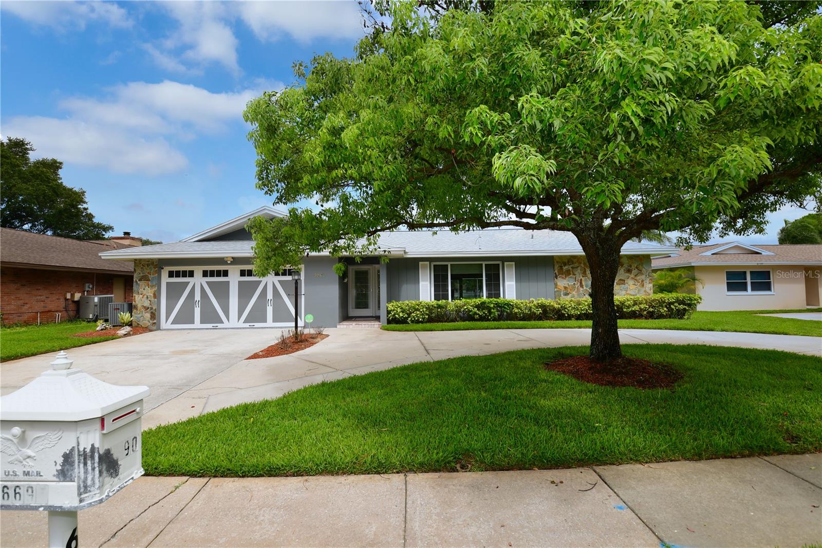 Tucked in a peaceful and highly sought-after neighborhood in Seminole Lake Country Club. Located right off the 17th hole of the reputable Seminole Lake Golf Course, this 4-bedroom 3 bathroom residence boasts many wonderful updates, a modern and tasteful design, and pool. The large gourmet kitchen has been freshly remodeled with beautiful granite, backsplash, white cabinets, ambient lighting under and above cabinets, brand new Kitchen Aid double oven and dishwasher, cooktop with large stainless steal hood vent, and pot filler in the large island. New vinyl plank flooring has been added to the home. The spacious master suite includes a large walk-in closet and tastefully remodeled En-suite master bathroom. The Master bathroom has been fully remolded with large walk-in shower and new double sink vanity with large backsplash and designer faucets. Both the family room and living room are quite roomy. You can see amazing views of your large, private, heated, L-shaped pool and the beautiful green golf course from the living room, dining area, kitchen, and family room. This home includes an indoor laundry as well as a gas hot water heater and 2-car garage with storage cabinets. Book your private showing today.
