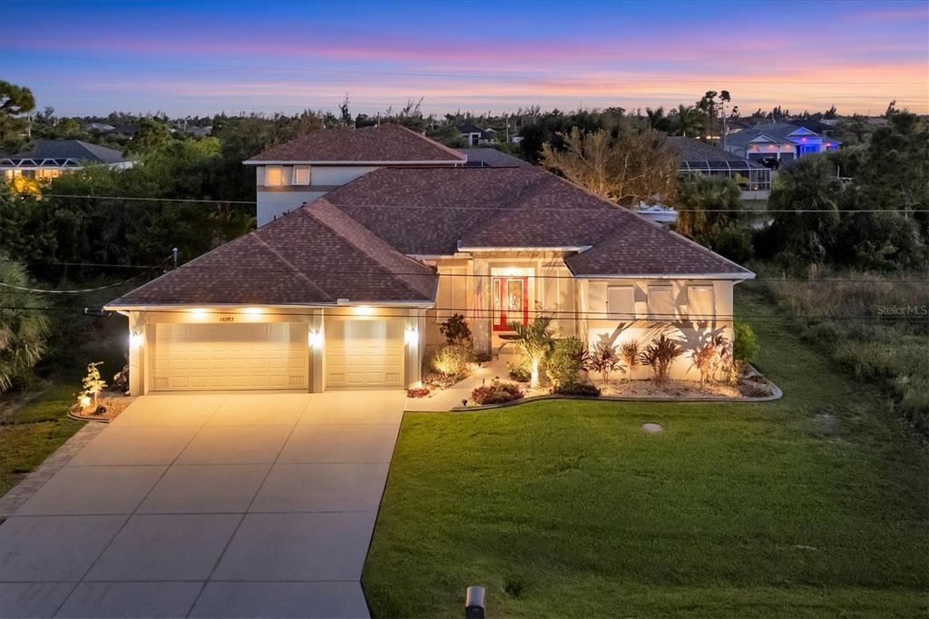 Photo of 15392 Aldama Circle, Port Charlotte, FL 33981 (MLS # D6144426)