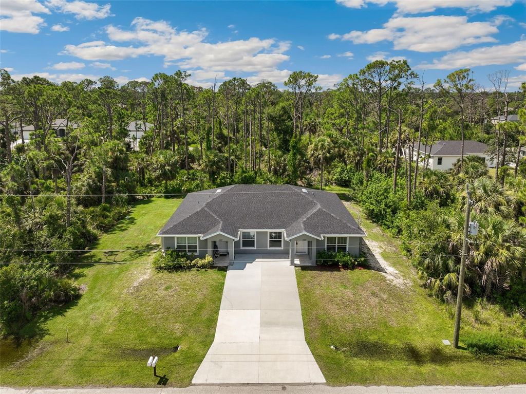Photo of 12007 Henley Avenue, Port Charlotte, FL 33981 (MLS # TB8418793)