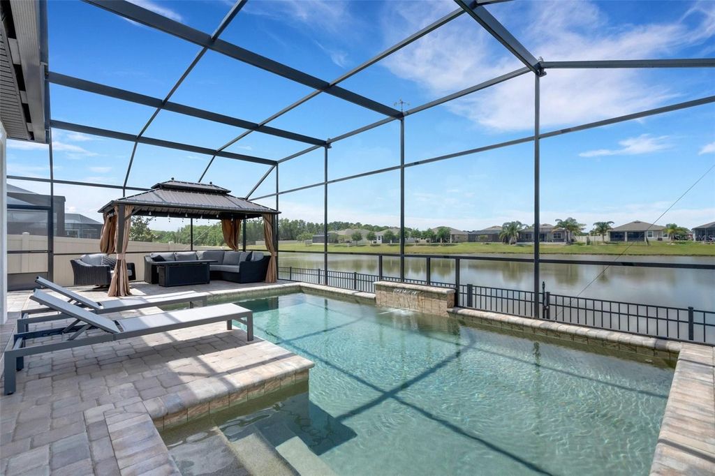 Photo of 7859 Yale Harbor Drive, Wesley Chapel, FL 33545 (MLS # A4648575)