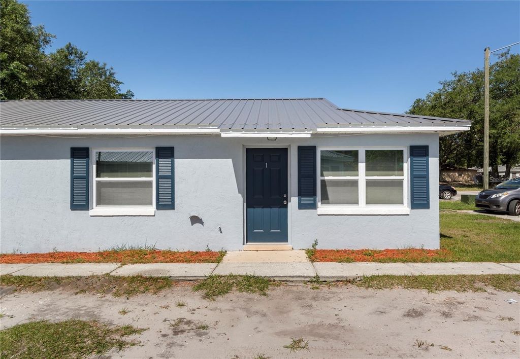 Photo of 1703 Birchwood Circle #1, Leesburg, FL 34748 (MLS # O6373757)