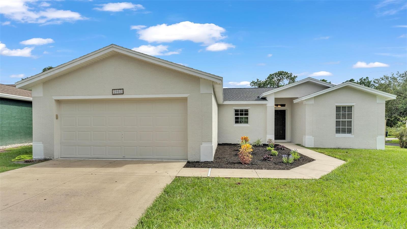 **MULTIPLE OFFERS**
Check out this Move-in-Ready Remodeled 3 bedroom, 2 bathroom home on a corner lot! You will LOVE the open floor plan with vaulted ceilings! The kitchen is the heart of this home and perfect for entertaining with newer appliances, ample countertops, bar seating, and a closet pantry. The great room is spacious with vaulted ceilings and sliding doors to the backyard. The master bedroom is separate from the other bedrooms for that privacy you may need. The master bedroom suite also has vaulted ceilings, walk-in closet, and a private bath. The en suite bathroom has double vanities, shower, and linen closet.
The spacious backyard is serene with a screened porch perfect for entertaining. You will appreciate the private fully fenced backyard with double gates. The many recent updates and upgrades include: New roof (2024), New AC (2023), all New paint (2024), all New flooring (2024), newer appliances, New fence, fresh landscaping, and more. Low annual HOA fee and NO CDD makes this community a great choice! So many outstanding features about this lovely home! Priced to sell! This one won't last long! Call today for your Private tour!
