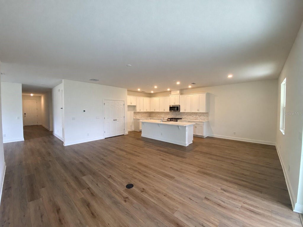 Photo of 416 Lemongrass Road, Minneola, FL 34715 (MLS # O6445343)