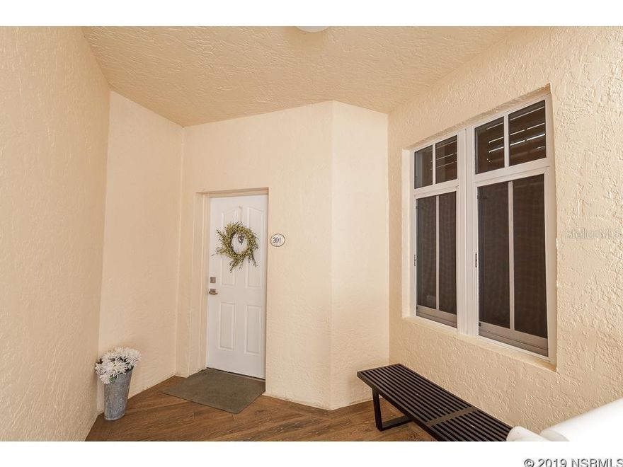 All the updates are done in this Decorator's Dream Home! Open living in this 4 bedroom 3 bath Direct Oceanfront condo in the Andros Building in Minorca. This NE corner residence has been professionally upgraded including built-ins & new Pirouette window treatments throughout with the Black Outs shades for nightime privacy. Low profile easy care carpet hugs the bare feet through the dining, living & bedrooms. There is Porcelain tile in bathrooms, entry and kitchen areas. Ocean views await from the massive east and north facing windows all along the master suite with a huge curved private balcony for morning coffee in the sun. The on-suite Master bath has a garden tub, separate shower and water closet. The vanity includes a Marble counter top with double sinks. Crown molding throughout, recessed lighting & cherry wood cabinetry. The Kitchen offers a center island with Corian counter tops & stainless steel Monogram series appliances & a built in wet bar in the kitchen plus a pantry.  Sliding glass doors in the kitchen lead to patio for ease of outdoor entertaining.  There are 3 massive balconies to enjoy outdoor living on east, west and north sides of the condo. A Micropure Active Air Purifier has been installed in the Air Conditioner.One secured, parking spot underneath the building. Plenty of guests spots to park on south side. Andros has private walkover to ocean & shares a pool area with the Capri Building only, so no need to leave the haven & go to the main pool. The other amenities include; a casino clubhouse with billiard and card room, fitness center, spa by the pool, 6 Har Tru lighted tennis courts & tennis clubhouse. Launch a kayak, small boat or paddle board from the River pavilion or surf on the ocean side and then have a picnic lunch at the oceanfront pavilions. Secure Gate house entry.  Walk just steps to the 220 acre Smyrna Dunes Park boardwalk to watch dolphins, bird life, walk the dog along the beach and view wild turtles. HEAVEN! ;LocationDescription: Condo ;Water: City