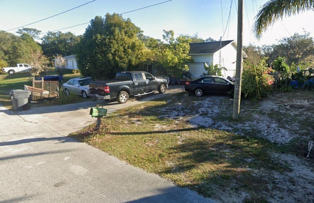 Photo of 523 Cipres Circle, Winter Haven, FL 33880 (MLS # O6363892)