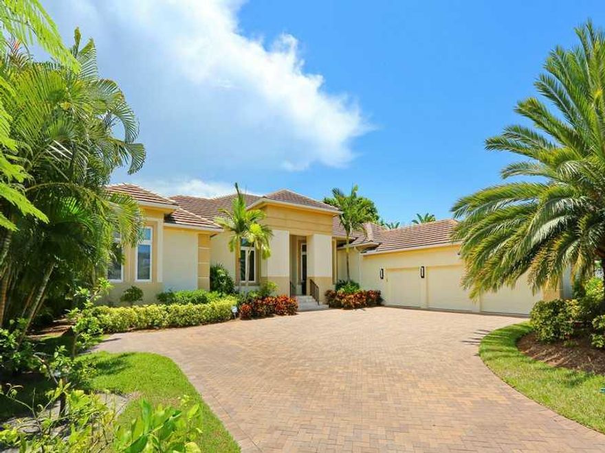 Enter the front doors of this stunning custom home and instantly you are mesmerized by the dancing water and captivating views of the bay and city. Situated for the ultimate vistas and extreme privacy, the home boasts four bedroom suites, half bath, spacious family room with fireplace, wonderfully open and functional chef's kitchen, separate formal dining room and large living room. The outside pool area with terraces is perfect for entertaining and relaxing and offers a fireplace and summer kitchen. The lavish master suite features his-and-her walk-in closets, generous bath with dual sinks, large spa tub, step-in shower and more extraordinary water views. Additionally, there is a three-car garage and gated entry.