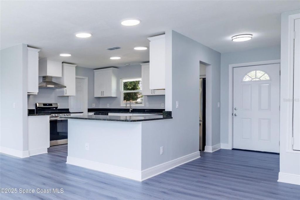Photo of 2411 Stanford Drive, Cocoa, FL 32926 (MLS # O6353368)
