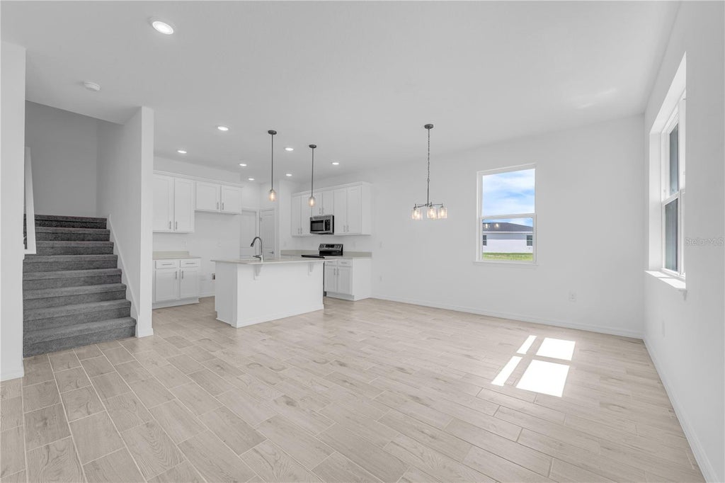 Photo of 1666 Meadowgrove Avenue, Saint Cloud, FL 34771 (MLS # O6444669)