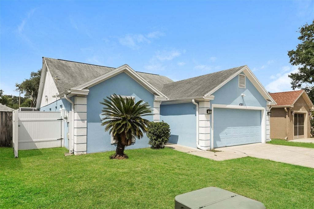 Photo of 4720 Dunquin Place, Tampa, FL 33610 (MLS # O6403784)