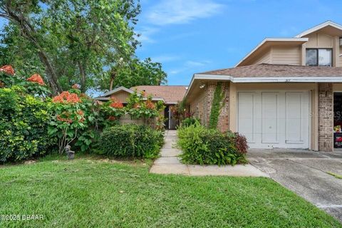 Photo of 517 Brown Pelican Drive, Daytona Beach, FL 32119 (MLS # FC314158)