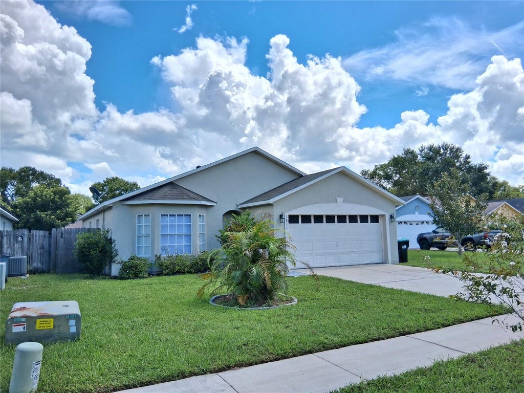 Photo of 2835 Palm Isle Way, Orlando, FL 32829 (MLS # O6443347)