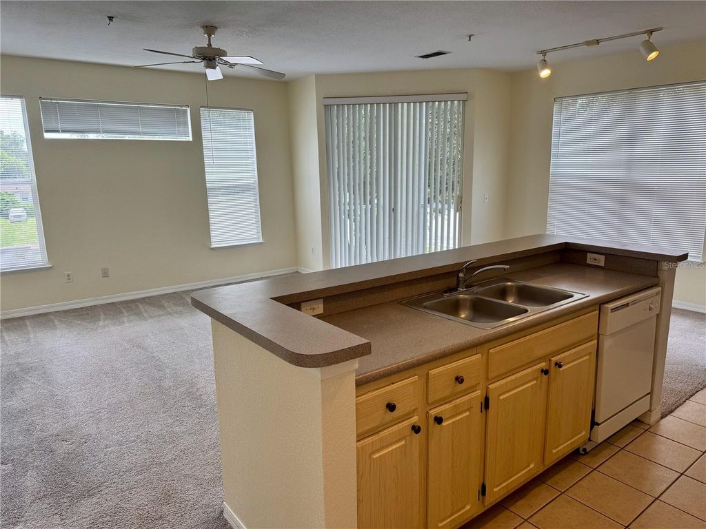 Photo of 2718 Maitland Crossing Way #202, Orlando, FL 32810 (MLS # O6354387)
