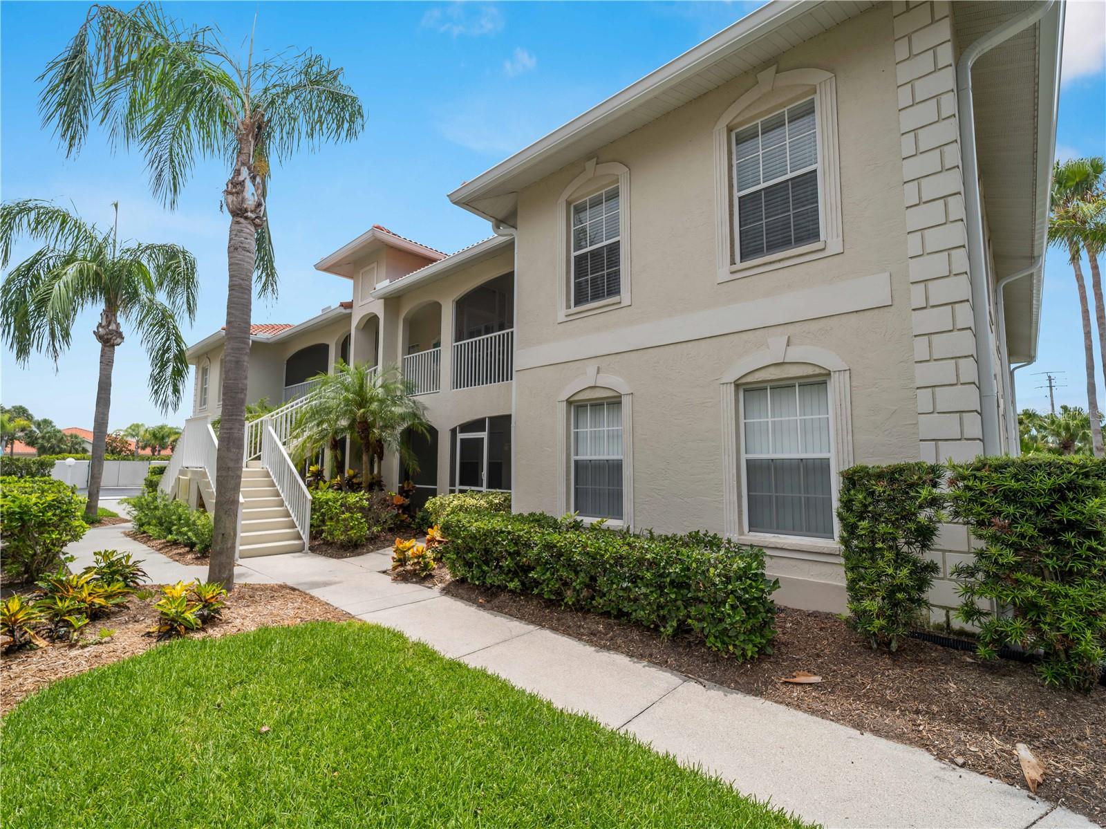 Under contract-accepting backup offers. One or more photo(s) has been virtually staged. Two bedroom, two bath, second floor condo, in desirable L Pavia. The condo features an open floor plan with a family room and living room. It has a dining area and a breakfast bar. Lots of natural light in this unit. The kitchen has a closet pantry and the washer and dryer are behind the dining area. Both bedrooms have a walk-in closet with new laminate flooring. Large screened lanai. A one car garage is included in the sale. Just freshly painted inside. New roof. The AC system was replaced in 2019. L Pavia is a small community that has a heated community pool and clubhouse. This is a great central location just off of Venice Ave. Within a 3 miles to beautiful downtown Venice and the beach. Downtown Wellen Park, Atlanta Braves Training Stadium is about 8 miles away. Come take a look today!
