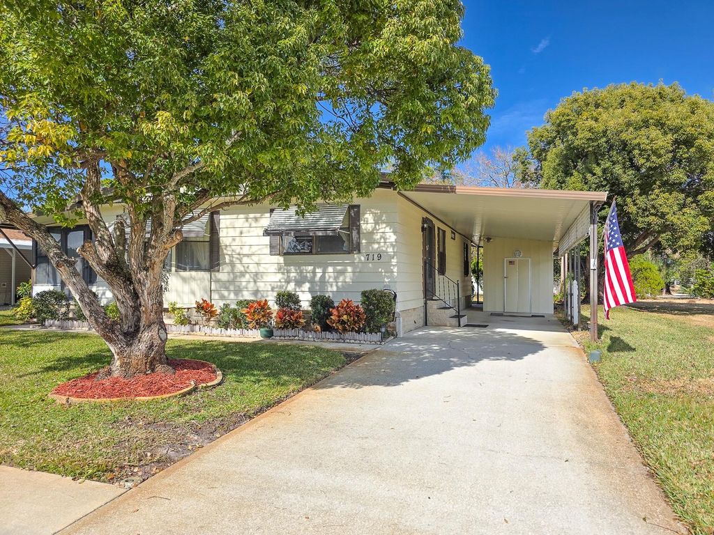Photo of 719 Dove Avenue, Port Orange, FL 32129 (MLS # NS1087142)