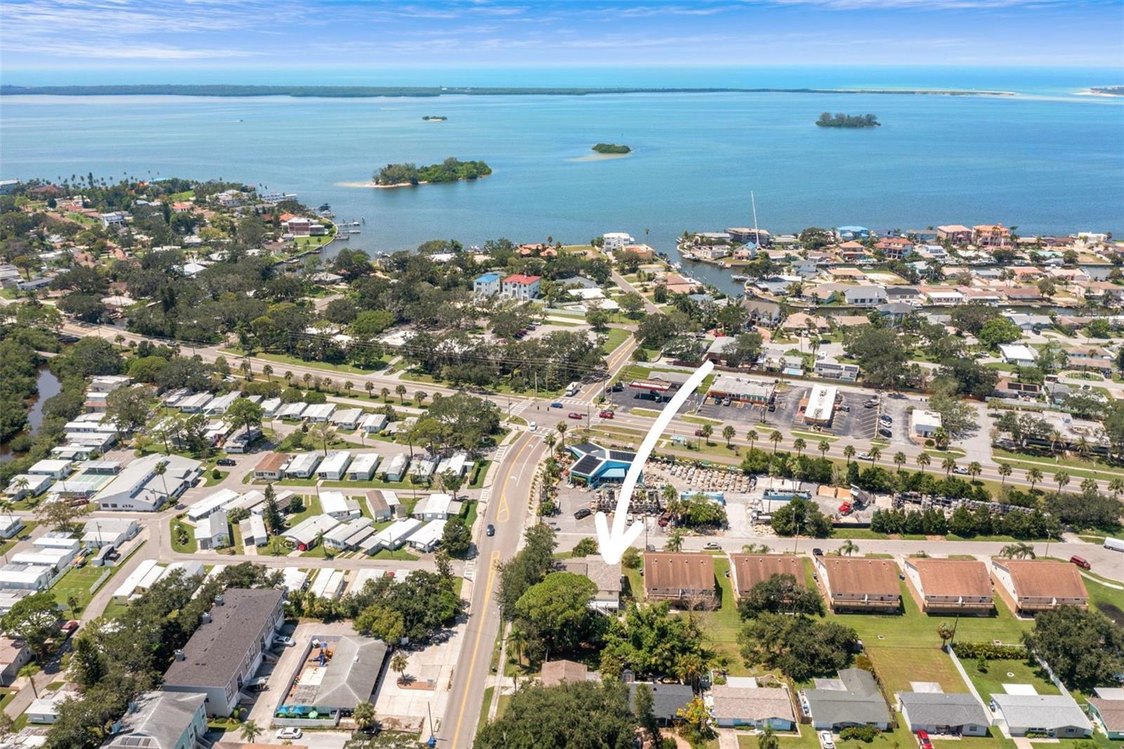 Live the ultimate Dunedin lifestyle in this one-of-a-kind home located right on the Pinellas Trail and just minutes from Downtown Dunedin, the Causeway, Hammock Park, the Fine Arts Center, the Community Center, Dunedin Golf Club, and Highlander Park. With its single-family design in a townhouse-style construction and absolutely no HOA, this home delivers both flexibility and freedom.
The upper level showcases a spacious open floor plan with vaulted ceilings, two oversized bedrooms, and two full bathrooms, all accented by a spiral staircase that leads to a roomy loft. The owner’s suite offers a private walk-out deck and a spa-style bath complete with a whirlpool tub, while the newer kitchen shines with granite countertops, stainless steel appliances, and abundant storage—perfect for cooking and entertaining.
On the ground floor, you’ll find a 650 sq ft studio in-law suite with its own full bath, kitchenette, and screened-in patio that opens directly to the fully fenced backyard. It’s the ideal setup for multi-generational living, private guest quarters, working from home, or even generating rental income. The lower level also includes a fully finished 480 sq ft two-car garage with laundry facilities, built-in storage cabinets, and optional A/C, making it the perfect workshop, gym, or creative space.
This property comes with a brand-new roof installed in April 2024 with a transferable warranty from Dunedin Roofing, plenty of parking, and even a secured parking pad for your boat or RV. For those looking to maximize income potential, a conditional use permit can be applied for to operate a Bed and Breakfast out of the first-floor living space, allowing single-night rentals.
With unbeatable location, flexible living options, and thoughtful updates, this Dunedin treasure truly has it all. Don’t wait—schedule your showing today before it’s gone!
