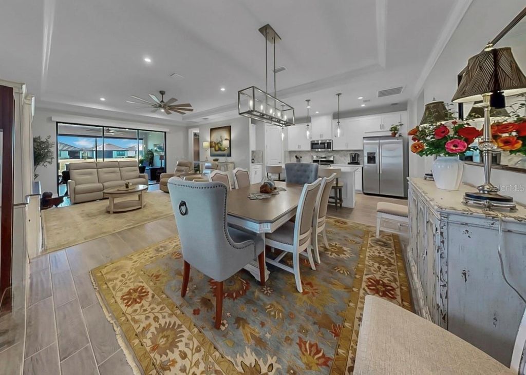 Photo of 11120 Devonbridge Drive, Palmetto, FL 34221 (MLS # A4676815)