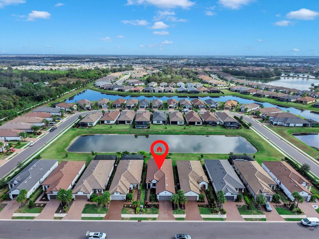 Photo of 11120 Devonbridge Drive, Palmetto, FL 34221 (MLS # A4676815)