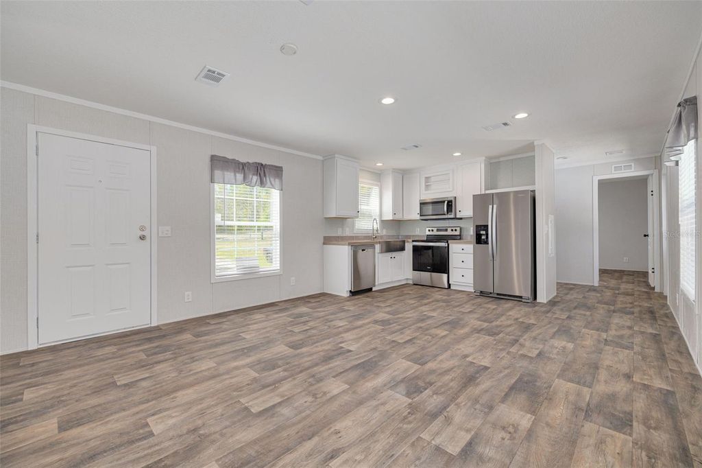 Photo of 10617 Denton Avenue, Hudson, FL 34667 (MLS # TB8449798)