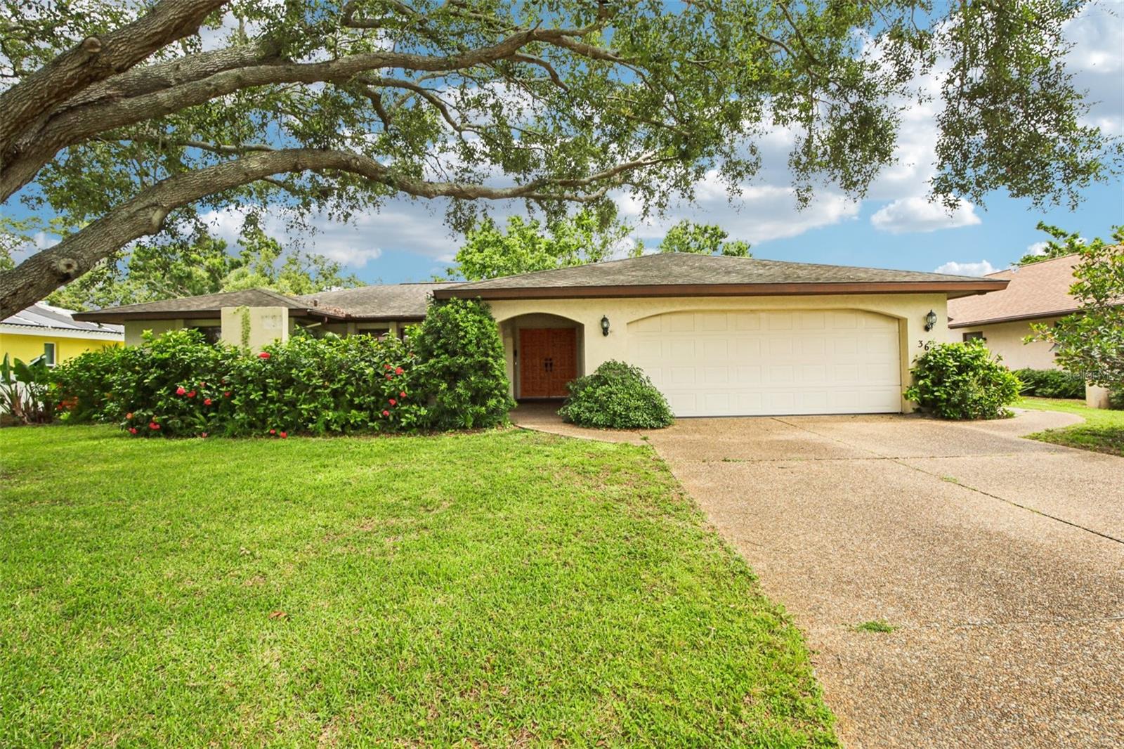 Welcome to 3640 Aster Drive, located in the desirable Beneva Pines community in Sarasota! This low-HOA ($350/yr) neighborhood is ideally situated just minutes from Siesta Key, downtown Sarasota, St. Armands Circle, and the UTC Mall — putting premier beaches, dining, shopping, and entertainment all within easy reach.
This executive-style home features a popular split-bedroom floor plan with 3 bedrooms and 2 bathrooms. The spacious living room opens to a light-filled sunroom through sliding doors, offering tranquil views of the private backyard. The formal dining room sits adjacent to the kitchen, which flows seamlessly into a grand family room with soaring vaulted ceilings — perfect for entertaining or relaxing.
On the east side of the home, the primary suite offers a walk-in closet and en-suite bath. On the opposite side, two well-sized guest bedrooms share a full bath, offering privacy and comfort for family or visitors.
Additional highlights include a sunroom with dual access from both living and family rooms, indoor laundry room, an oversized 2-car garage and a quarter-acre lot with plenty of space to add a pool!
This home has great bones and is priced to allow for your personal updates and vision. Don’t miss the opportunity to make it yours — schedule your private tour today!