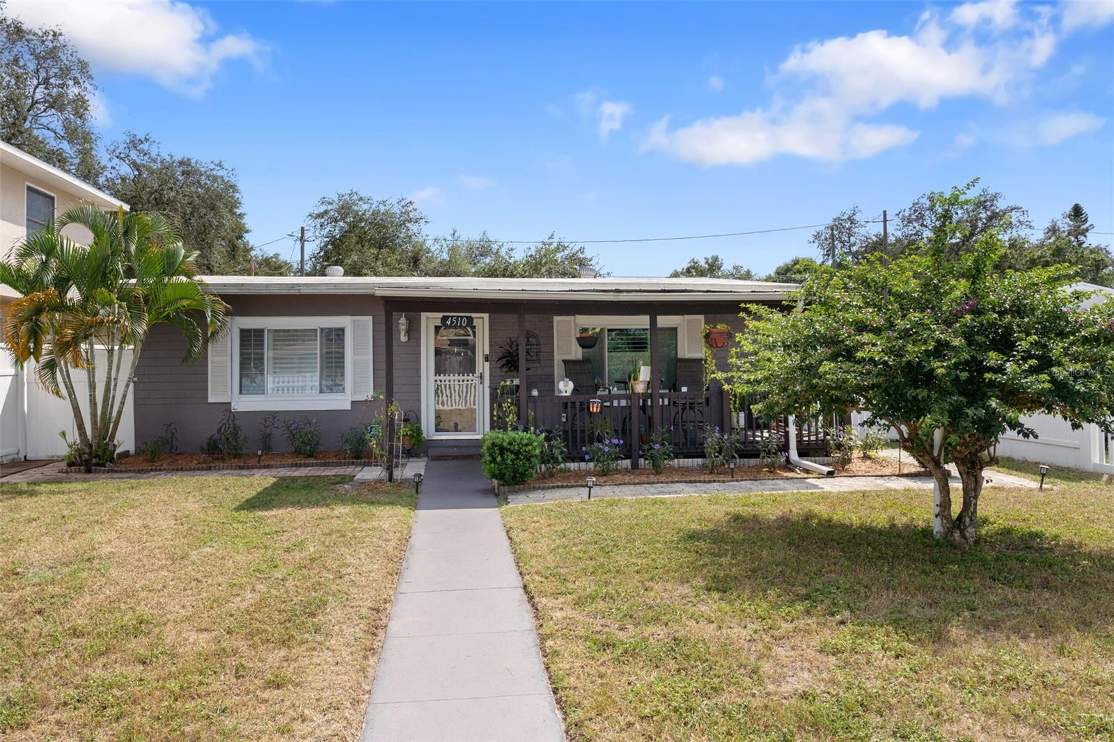Adorable St. Pete home with a brand new roof (scheduled Oct. 2025), spacious layout, and plenty of charm. This 2 bedroom, 1 bath home features a large kitchen, comfortable living room, inside laundry, and even an additional bath in the garage for extra convenience. Throughout the home you’ll find timeless interior shutters that add style and function while filling each room with natural light. The fenced front and back yards offer great space for pets, gardening, or simply enjoying the Florida sunshine. Best of all, it’s not in a flood zone, giving you peace of mind along with a great location. Centrally located near shopping, dining, the interstate, and just minutes from the beach, this home is ready for its new owner. Schedule your showing today and see why this one won’t last long!