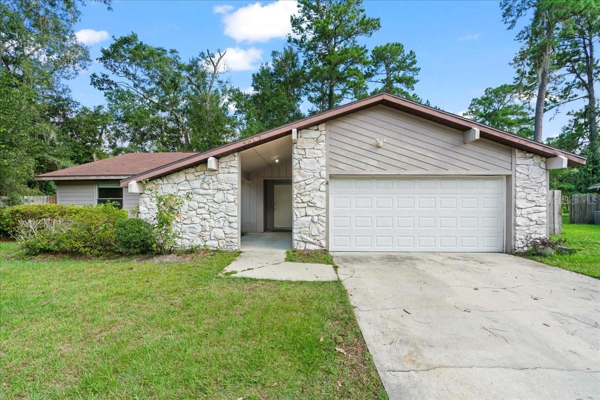 If you are looking for a home in a quiet neighborhood with no HOA and a large backyard to make your own, this is one is for you!
Walk in through a courtyard with built-in planters to a welcoming foyer lit with a sky light. The living area then welcomes you with a stone fireplace and sliding doors that give you a view of the spacious fenced backyard. There is a separate dining area that leads into the kitchen with ample storage space. The two car garage has access to the side yard. Rustlewood is a quiet neighborhood in a fantastic location. Schedule a showing today!