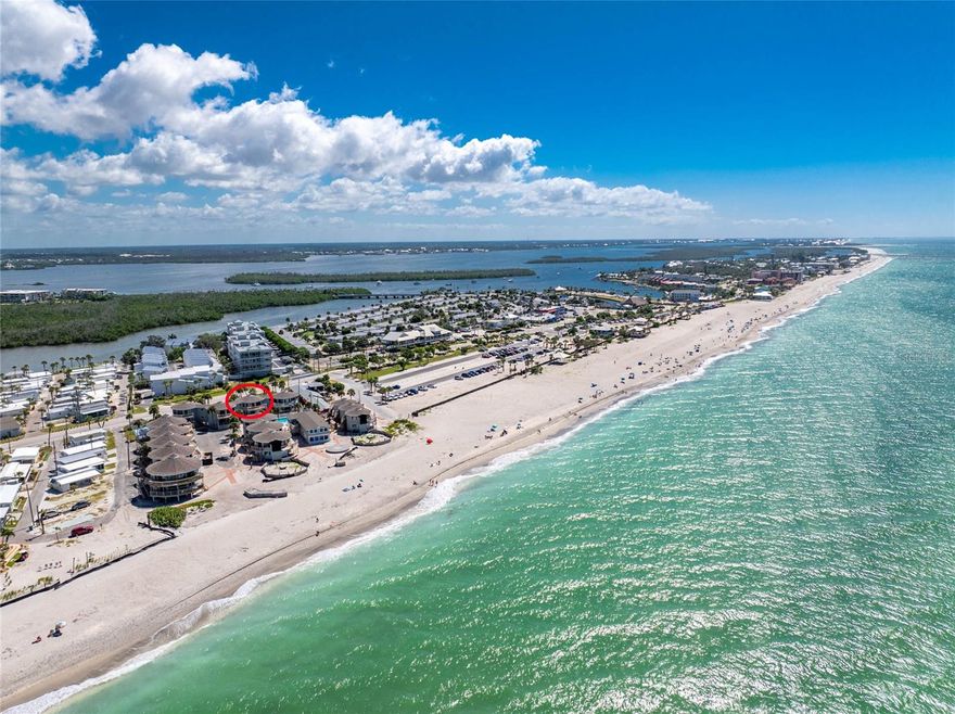 Steps from the Beach, Sunsets Overlooking the Pool from Your Deck, and All the Charm of Manasota Key Living at this turnkey- furnished Castaway Condo! Wake up to the sound of waves, spend your afternoons strolling miles of sandy shoreline, and end the day with sunsets from your private deck. This beautifully updated 2-bedroom, 2-bathroom condominium at Castaways is designed for easy living and endless enjoyment, just steps from the sparkling Gulf of America. From here, you can walk to fun tiki bars and several restaurants that make Manasota Key such a sought-after destination. Inside, the turnkey furnishings and coastal style create a relaxed retreat with laminate flooring throughout, a bright open layout, and vaulted ceilings that let the Florida sunshine pour in. The great room has two large windows with water views and the combined dining area is perfect for gatherings. The kitchen stands out with white cabinets, coastal blue quartzite countertops and a pantry cabinet. The bedrooms feature reach-in closets while the bathrooms feature elegant granite finishes. Both decks are made for unwinding with breezy pool views and plenty of space to soak up the tropical air. The Castaways has a heated full-size pool, cabana, gas grills, and a sunset deck right on the beach. On-site management makes ownership effortless, with high-volume rental potential and a loyal base of repeat guests when you’re not here to enjoy it yourself. Whether you’re looking for a personal coastal escape or a smart investment property, this residence at 2240 N. Beach Road offers the perfect blend of lifestyle and convenience. Schedule your private showing today and see why life on Manasota Key feels like a vacation every day.
