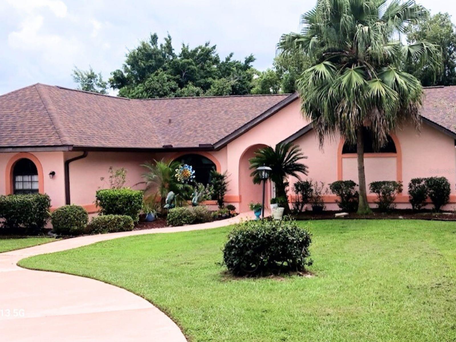 PHOTOS COMING SOON! Welcome to 1282 Lake Lotela, a beautifully maintained 4-bedroom, 2.5-bath home on a lush corner lot just 7 minutes from Hwy 27. Major updates include a new roof (2024), HVAC (2021), exterior paint (2025), well (2017), and serviced septic (2023), making this home move-in ready. Inside features a spacious split floor plan with formal living and dining, a family room with cathedral ceilings, wet bar, and direct access to the oversized pool—perfect for entertaining. Modern upgrades include reverse osmosis to the fridge, solar hot water, hurricane-rated garage door, hurricane shutters, and lanai storm shade. Tropical landscaping with banana trees, pineapples, and a canopy of trees creates a serene oasis. Blending style, function, and Florida charm, this home is ideal for families or anyone seeking the best of Avon Park living near Lake Lotela and shopping.