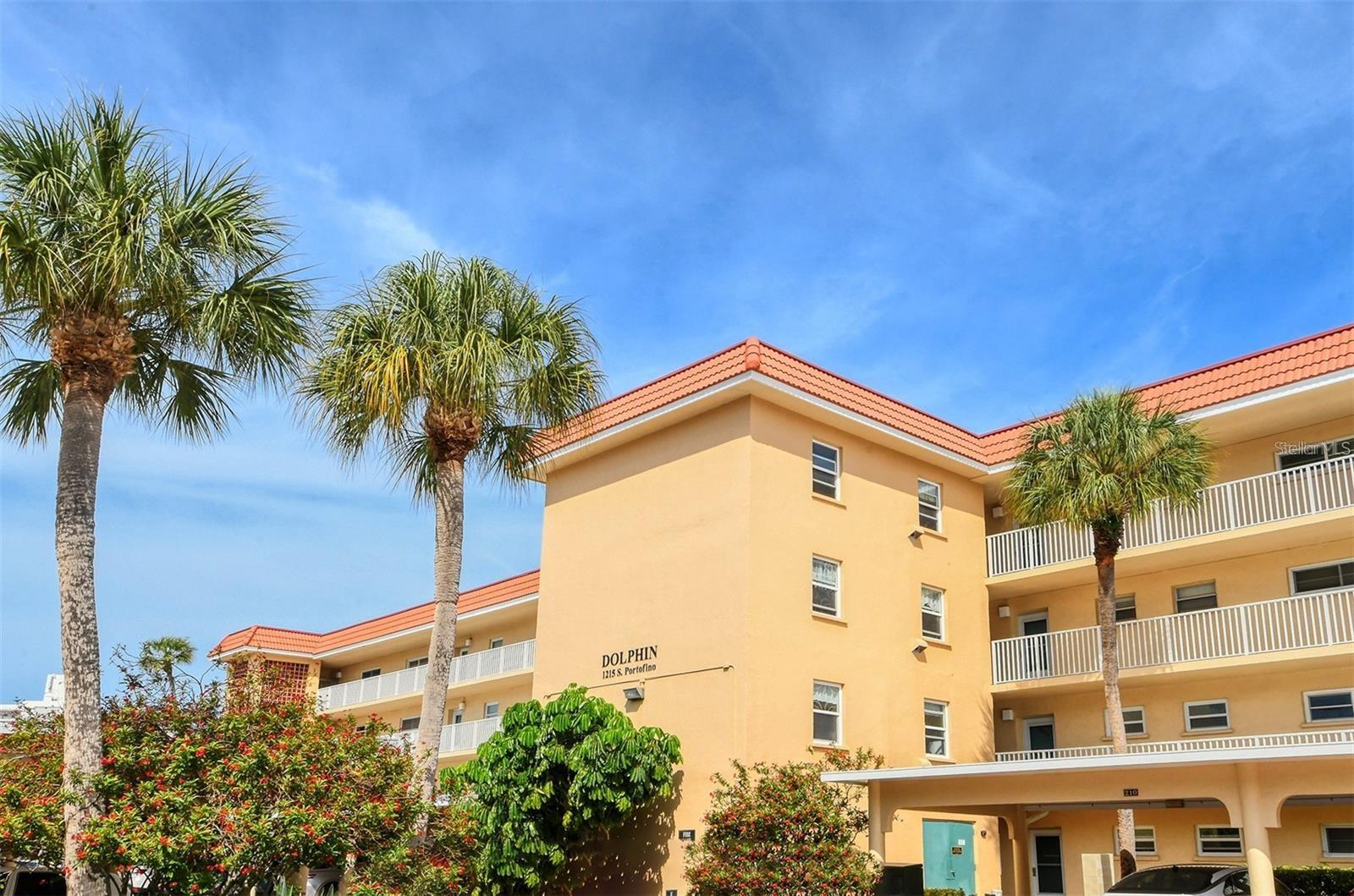 BEAUTIFUL WATERFRONT CONDO IN SIESTA HARBOR! CANAL VIEWS • BEACH ACCESS • BOAT SLIPS ON SITE REASONABLY PRICE, CHECK AVAILABILITY. Condo available Fall 2025 — and May through December 2026! Step into coastal luxury in this private, beautifully furnished corner end-unit in the highly sought-after Dolphin Building of Siesta Harbor. Enjoy gorgeous water views of the canal from your enclosed hurricane glass lanai, and walk just across the street to direct beach access. Spacious 2 Bedroom / 2 Full Bath layout, fully remodeled, Turn-key furnished with coastal décor and upscale appointments. Canal-front views from a bright, airy, light-filled space. Gourmet kitchen with granite countertops and rare extended layout! Modern upgrades throughout: frosted glass panel doors, accent walls, updated baths, Tile flooring throughout with a clean, coastal feel and High-impact windows and hurricane glass-enclosed lanai. Resort-style heated pool and spa along the wide canal. Active 55+ community with Clubhouse, fitness room, saunas, outdoor spa plus a fishing pier on the Intracoastal Waterway. Walkable to shops, restaurants, and iconic Siesta Key Beach and Siesta Key mini-donuts! Easy access on and off the key, SCAT stop and trolley just outside your door. Whether you're looking for a peaceful retreat or an active community lifestyle, this impeccably maintained, move-in-ready condo has it all. Elevate your living experience in one of Sarasota’s most desirable waterfront communities — your dream home awaits!