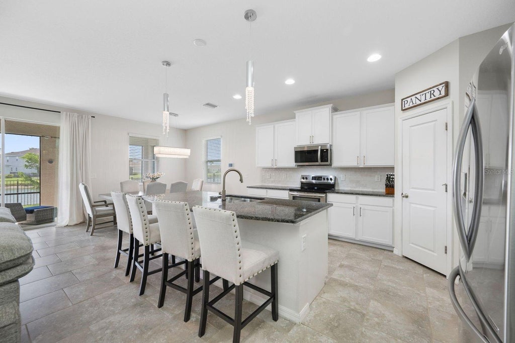 Photo of 6549 Devesta Loop, Palmetto, FL 34221 (MLS # A4701643)