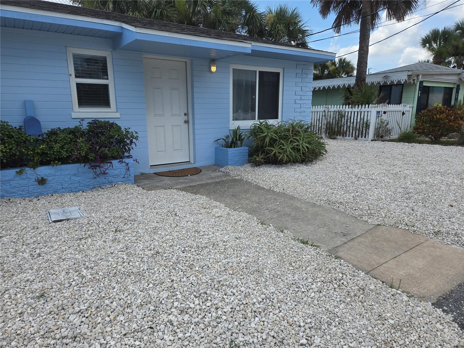 Live the Beachside Lifestyle in this beautiful half duplex located directly across the street from the ocean and beach. This home is meant for relaxing and enjoying the sunshine state. Unit has been completely redone and features a living/bedroom combination with a fully functional beachy kitchenette off of living room area and if you need that extra space, couch converts to a full size bed and is 'brand new". Full bath with shower, closet and comes fully furnished. Mini split unit with AC/Heat, TV with WiFi. Private space outside for relaxing after a long day of enjoyment and outside shower for cool rinsing off and you can still hear the waves and smell the ocean air from your beachside retreat. Approx 1 block to Historic Flagler Ave where you can enjoy restaurants, shopping the quaint shops and year round entertainment also, beach driving is allowed but a fee is required. This is a place for enjoyment and offers a special lifestyle where dreams are made of. This can be your sweet place to call home and offers all the enjoyment of life. All of this and all you have to bring is your toothbrush. Can't beat it. All information is assumed accurate. Measurements are approximate. Renters and or Renters agent to verify all and any information or facts that are important to you.