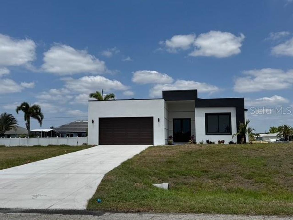 Photo of 101 NW 10th Terrace, Cape Coral, FL 33993 (MLS # C7509917)