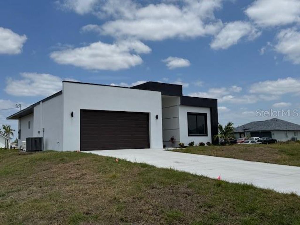 Photo of 101 NW 10th Terrace, Cape Coral, FL 33993 (MLS # C7509917)