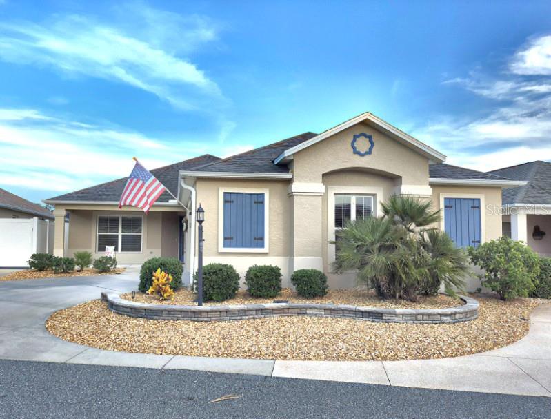 Welcome to this rare FAIRMONT MODEL nestled just minutes from Brownwood Paddock Square. This beautifully updated 3-bedroom, 2-bath home offers an inviting OPEN FLOOR PLAN with BRAND NEW LUXURY VINYL PLANK flooring throughout—NO CARPET. The tile has been professionally cleaned, and the FRESHLY PAINTED exterior adds to its MOVE-IN READY appeal. The ENTERTAINMENT-style kitchen is brightened by a solar tube and opens seamlessly into the ENCLOSED LANAI, complete with roll-down shades and double-pane patio doors. The lanai overlooks a FULLY LANDSCAPED, low-maintenance yard that backs to a privacy wall—with plenty of space to add a pool. TRAY CEILINGS in the primary suite create a spacious retreat, enhanced by a walk-in TILED SHOWER, solar tube, and double sinks. Both bathrooms feature tiled showers for a modern, upgraded feel. Additional highlights include double-pane windows, low-voltage exterior lighting, and built-in shelving in the two-car garage. The seller is offering a HOME WARRANTY for peace of mind. This is a rare opportunity to own one of the most desirable floor plans in a prime location—schedule your private showing today.