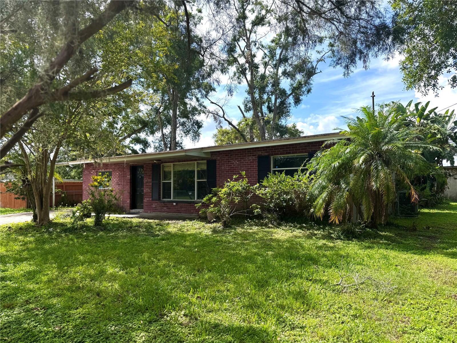 Location Location Location. Welcome to one of Tampa’s best kept secrets in the wonderful community of Citrus Park. This home Features a Coveted DOUBLE LOT. Move in with the family or split it up and create two new homes, this property is priced to sell. A lovely 2 bedroom 1 Bath, this home is perfect for economical living. The best schools are just walking distance as well as some of the best shopping in the area with Citrus Park Town Plaza and for the outdoor enthusiasts, The Suncoast Trail is steps away giving you access to some of Florida’s best trail systems as well as school systems. Explore nature at your leisure; or be minutes away from Tampa International Airport. You’re going to love what this community has to offer.