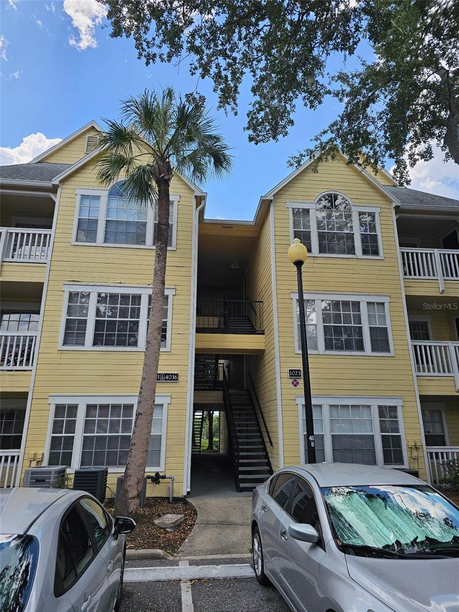 Welcome to this well-maintained 1-bedroom, 1-bathroom ground-floor condo located in the desirable Tradewinds community in MetroWest. This bright and open unit features a spacious living area with sliding glass doors leading to a private patio, a generous primary bedroom with a walk-in closet, and a convenient in-unit laundry room. The kitchen offers ample cabinet space and a breakfast bar, perfect for everyday living or entertaining. Enjoy resort-style amenities including two community pools, a fitness center, tennis courts, a clubhouse, and scenic walking trails. Ideally situated near shopping, dining, Valencia College, Universal Orlando, and major highways for easy access to downtown Orlando and surrounding areas. Whether you're a first-time buyer, investor, or looking for a low-maintenance lifestyle, this property is a must-see! Equal Opportunity Housing.