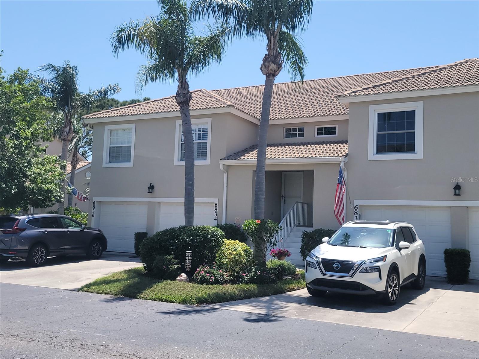 Your Country Club lifestyle awaits at Tara Golf & Country Club in Bradenton, Florida! This Fairway Gardens II condo comes with its own community pool just steps away. Stroll along the scenic paths through the trees or head to the clubhouse for the renowned Sunday Brunch and evening dinners. This 2nd floor condo overlooking the 4th fairway and a scenic pond offers maintenance free living with panoramic views in this beautifully landscaped community. This large 2/2 condo has a sunny and open floorplan featuring 13’ ceilings in main living areas and primary bedroom. Architectural details give this home lots of character for décor creativity. It is a split floor plan, with a large kitchen island open to the combined dining and living room. Both the living room and primary bedroom have sliders to the 28’ screened lanai that is the full length of the living room and primary bedroom offering beautiful views to enjoy watching golfers and wildlife as you relax or entertain. Kitchen has lots of storage and includes a built-in desk, recessed lighting, plantation shutters and much more. The laundry is conveniently located in the hallway between the 2nd bedroom, kitchen, and main living area. The primary bedroom has cathedral ceiling with high inset windows maximizing the natural daylight. In the one car garage you’ll find the water heater and extra walk-in storage for all your golf equipment, beach gear, luggage and more. This condo includes a deeded Class "B" Social membership to enjoy all the amenities… Clubhouse with fine dining, bar and grill room, concession stand at the main clubhouse pool with spa, Har-Tru tennis courts, a brand new 5-court pickle ball center opening in 2025, fitness facility with state of the art equipment, and a very active social calendar. Monthly COA condo fee for maintenance-free condo living, community pool maintenance, escrow reserve funds. Tara Golf and Country Club Class “B” deeded Social Membership Fee is $257.39 Monthly plus $60.00 Monthly food minimum. The Tara Master Assoc annual fee of $1,094.17 includes Comcast Cable TV, high speed internet, HBO and MAX. A one-time capital contribution of $1,525.00 is paid at closing. (Social Class B members can upgrade membership to full Class A golf membership should you elect to.) Easy access to I-75, airports, great shopping and UTC mall, arts, theater, entertainment, polo at Lakewood Ranch Polo Club, abundant dining options, and the greatest beaches on the Florida Suncoast. Don’t wait, make this your Florida Suncoast country club lifestyle!