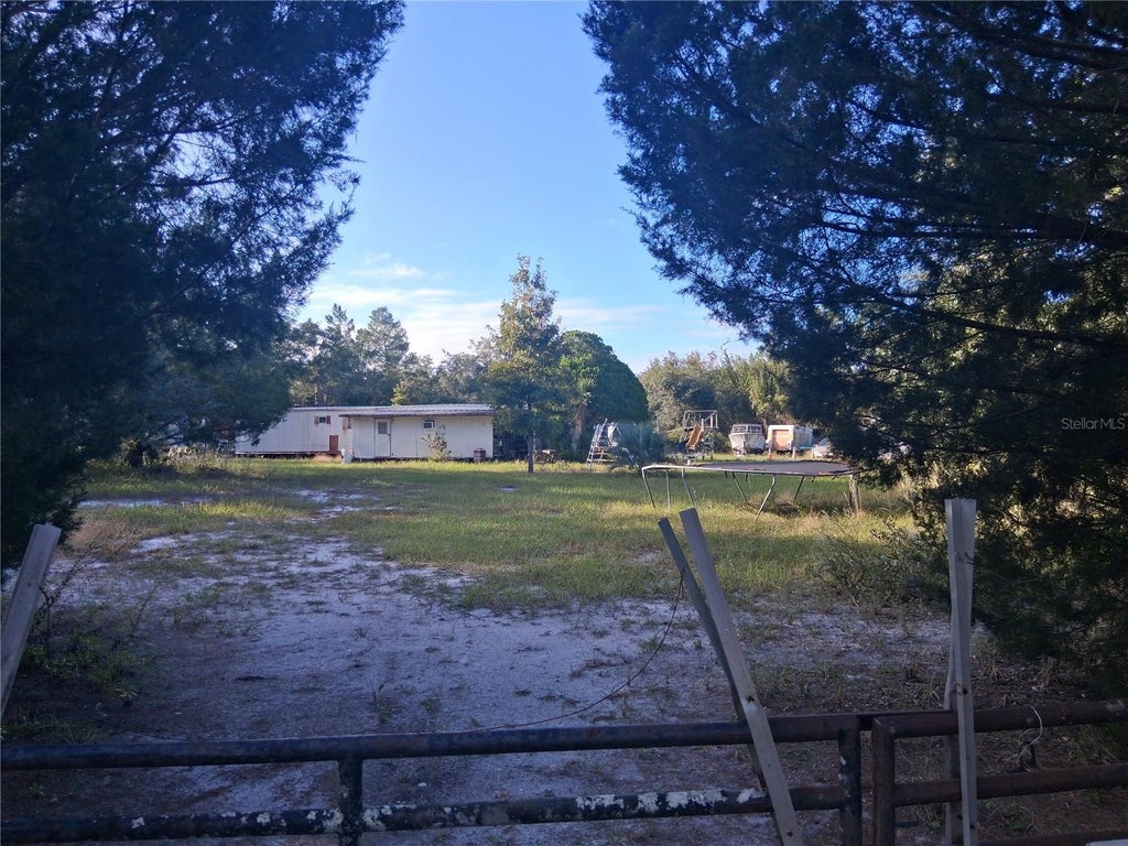 Photo of 1875 Alameda Drive, De Leon Springs, FL 32130 (MLS # V4952039)