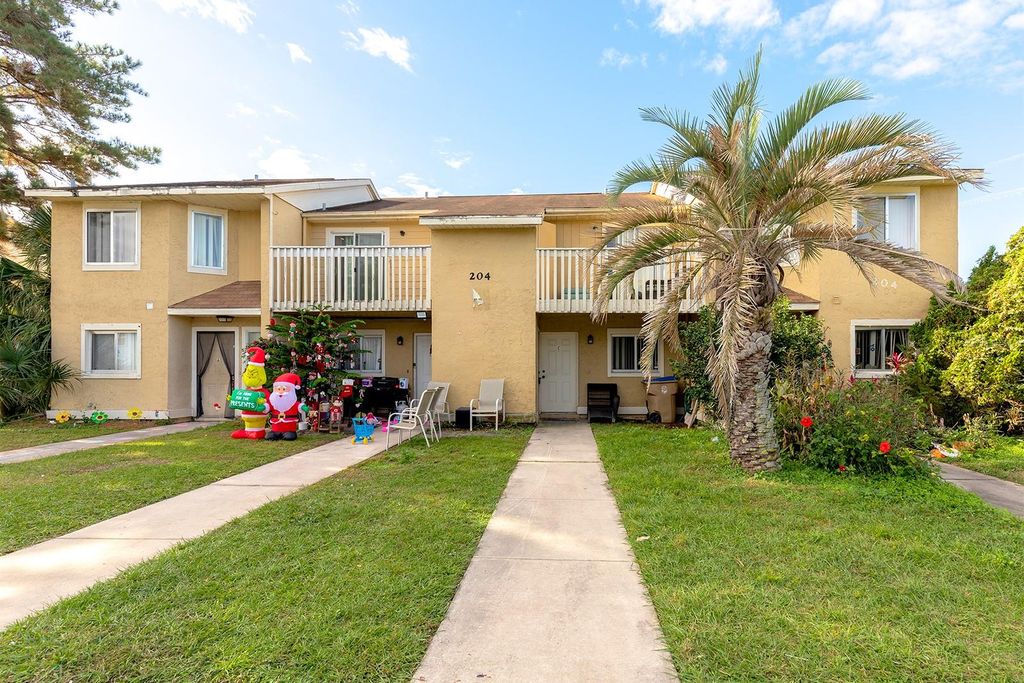 Photo of 204 Watts Lane, Kissimmee, FL 34743 (MLS # O6374793)