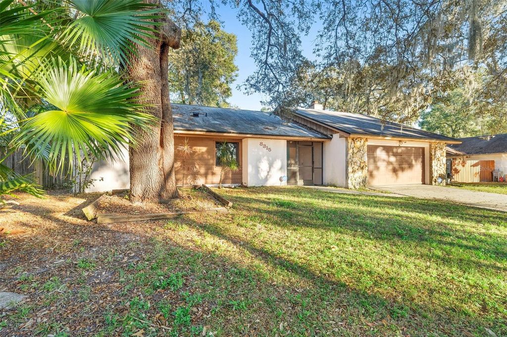 Photo of 8315 Camphor Tree Drive, Orlando, FL 32810 (MLS # O6367227)