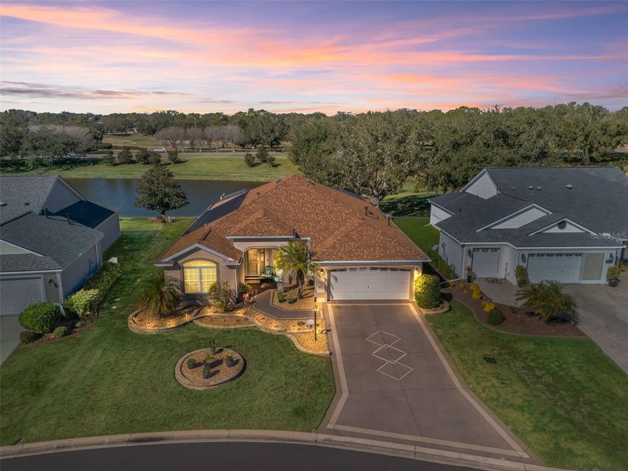 Enjoy resort-style living in this designer 3-bedroom, 2-bath luxury POOL home perfectly positioned on the Nancy Lopez Championship GOLF COURSE (with WATER VIEW) in the highly desirable Village of Briar Meadow. An elevated outdoor living experience showcases breathtaking golf course VIEWS, a SOLAR HEATED SALTWATER pool and spa, and a fully equipped OUTDOOR kitchen, ideal for entertaining or relaxing in style.



Curb appeal impresses immediately with immaculate raised STONE landscaping beds and a DESIGNER PAINTER driveway and walkway. Inside, the home features a tasteful blend of wood laminate, luxury vinyl, and carpet flooring, enhancing both comfort and elegance.



The open-concept great room flows seamlessly into a spacious dining area and a well-appointed kitchen offering QUARTZ countertops, a breakfast bar, and cozy breakfast nook. Thoughtful upgrades include pull-out cabinet drawers and a pantry designed for maximum functionality.



A desirable split bedroom floor plan provides privacy for guests. Two guest bedrooms share a beautifully updated bath with QUARTZ countertops, a COMFORT HEIGHT vanity, and a tiled tub/shower combination. The front guest bedroom is generously sized with PLANTATION SHUTTERS, while the third bedroom features a queen-size MURPHY bed with BUILT IN storage.



The primary suite is a serene retreat, complete with sliding glass doors to the lanai, two WALK-IN closets with added shelving for additional storage, a linen closet, SQUARE sinks, GLASS block windows, and a walk-in shower with DUAL shower heads.



The ENCLOSED, INSULATED lanai expands your living space and leads to an exceptional outdoor oasis. The OUTDOOR kitchen features tiled countertops and PENDANT lighting, while the SALTWATER pool offers built-in steps with DUAL benches, an ELEVATED HOT TUB, and stone pavers throughout. A Shade Sail provides comfort over the spa on warm Florida days.



Additional upgrades include:

• Wi-Fi Irrigation System

• Smart Thermostat

• Whole-House Water Softener

• Plantation Shutters in Living Room and Second Bedroom

• New HVAC (2021)

• New Pool Pump & Filter (2022)

• New Roof (2024)

• New Solar Panels (2024)

• New Comfort-Height Toilets (2024)

• New Pool Salt Cell & Electronics (2025)

• Brand-New Windows (2026)

• Ring Door Bell & Camera on Pool Area.



This exceptional GOLF FRONT/WATER VIEW home offers luxury, efficiency, and unforgettable outdoor living in one of The Villages’ most sought-after locations. Schedule your private viewing!