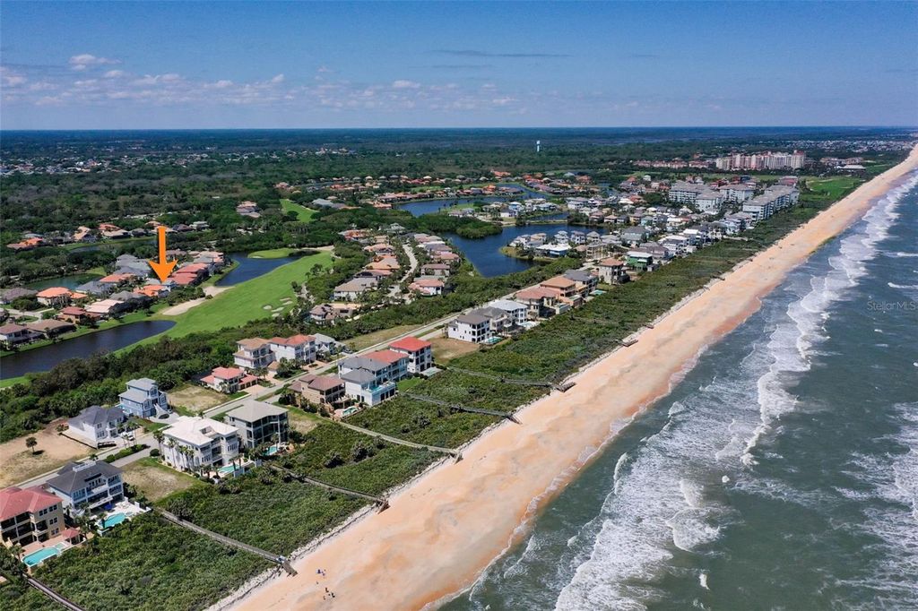 Photo of 15 Cypresswood Drive N, Palm Coast, FL 32137 (MLS # FC312554)