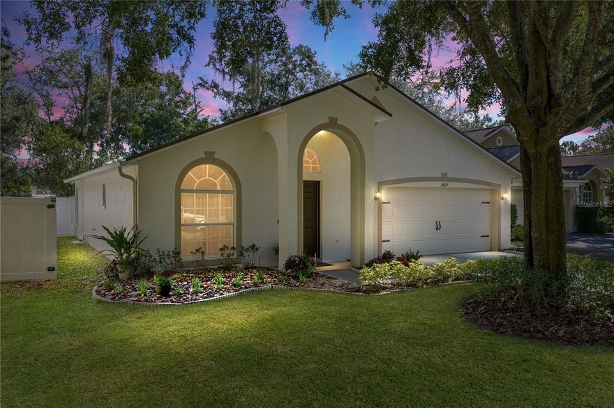 Situated along a delightful sidewalk-lined street in the established Stagecoach Village
community, this well-cared-for 3 bedroom, 2 bath, 2 car garage home offers a spacious, balanced
layout that feels open, inviting, and highly functional. Mature landscaping adds a warm first
impression, and the 2022 roof brings peace of mind before you even step inside. High ceilings
immediately create an open, airy feel. At the front of the home, a formal living and dining room
provide flexible areas that can shift easily with your lifestyle, whether you prefer a quiet sitting
room, a play space, or a dedicated entertaining area. Further in, the family room and kitchen
come together in an easy-flowing layout overlooking the screened porch. The kitchen is well
arranged with breakfast bar seating, an eat-in dinette, pantry storage, and newer Samsung
stainless steel appliances. The primary suite sits privately on its own side of the home and
features a large walk-in closet along with an ensuite bath offering dual sinks and a tub/shower
combo. Bedrooms 2 and 3 are thoughtfully placed on the opposite side, and they share the
home’s second full bathroom nearby. Peaceful Florida living awaits outdoors, where the screened
back porch offers a relaxing place to unwind while overlooking an expansive, fully fenced yard
with plenty of room to play, garden, or customize to suit your needs. Stagecoach Village adds
even more to enjoy with a clubhouse, fitness center, swimming pool, sports courts, and
community spaces. All of this comes with a central location right between Wesley Chapel and
Land O Lakes, placing everyday shopping, dining, entertainment, and major highways just
minutes away. Call today to find out if this home is the perfect fit for you!