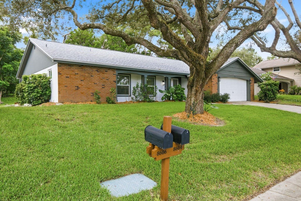 Photo of 8604 Mill Creek Lane, Hudson, FL 34667 (MLS # TB8543714)
