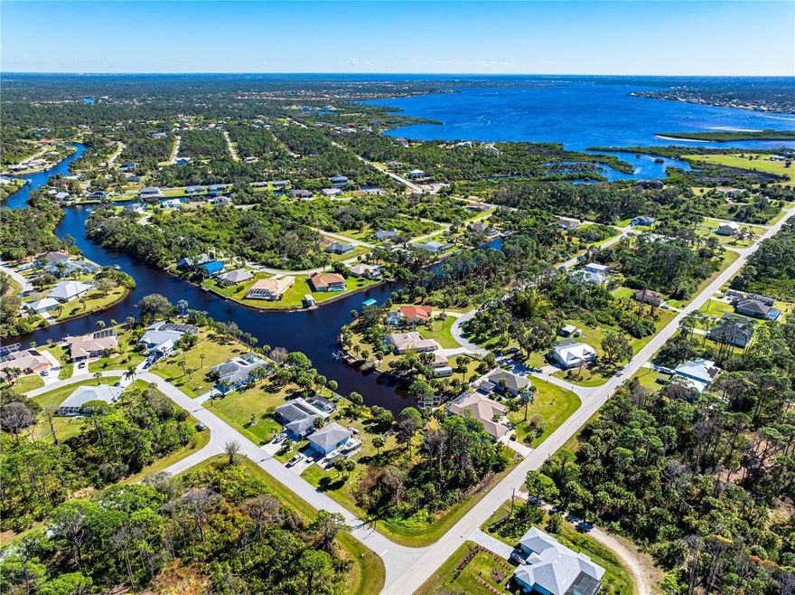 Oversized waterfront, corner lot! This half-acre property offers so many possibilities. Experience the leisurely activities of fishing, boating and breathtaking views directly from your backyard! Waterway access, leading to the Myakka River! Enjoy some of Florida’s beauty at its finest, from the convenience of your home.