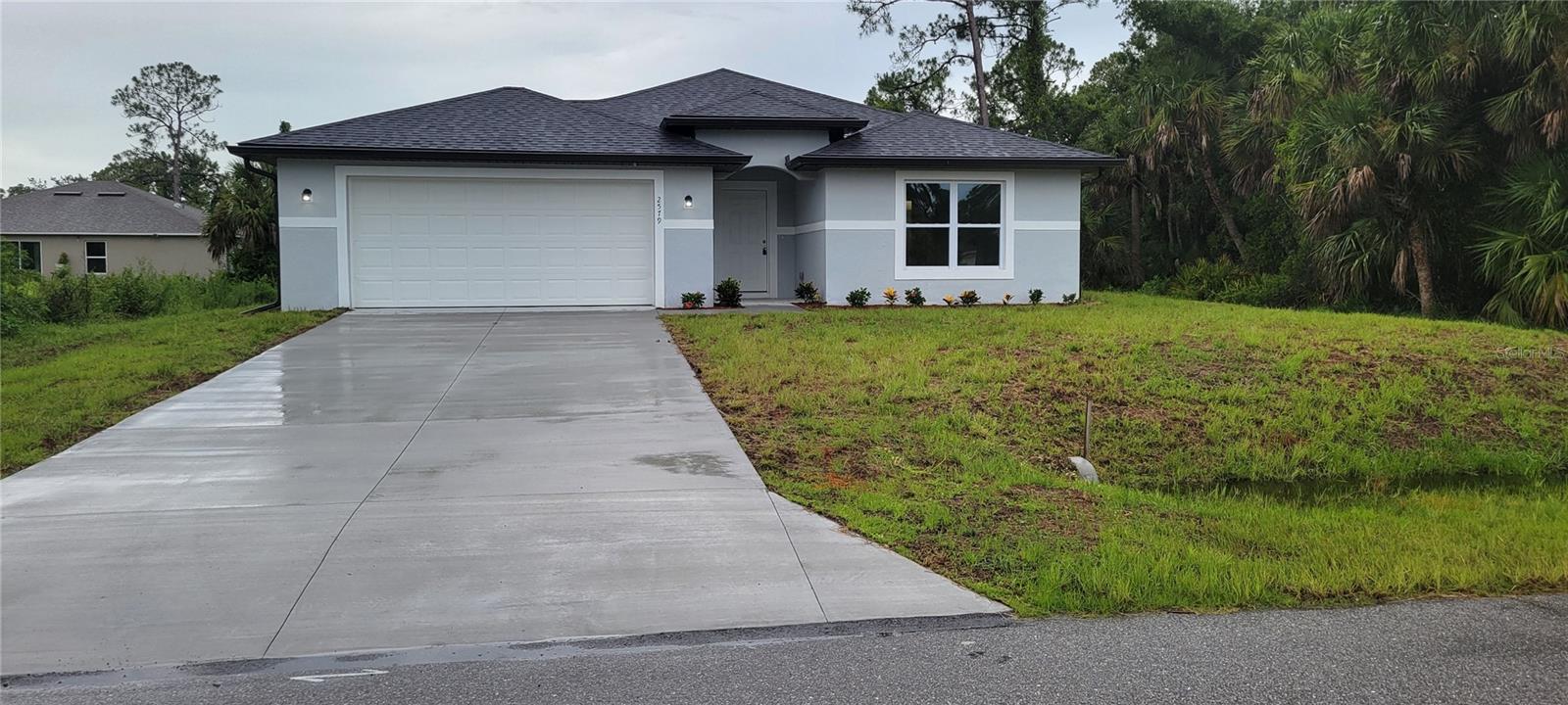 Available immediately for annual rent in North Port, this brand-new home built in 2025 has never been lived in. It features 4BR 2BA and nearly 1,800 square feet of living space. The open-concept design includes a spacious kitchen with a large island, perfect for entertaining. Situated on a 10,000-square-foot lot, the property offers ample outdoor space while being conveniently located near I-75. Additional features include a laundry closet and a two-car attached garage. Credit and background checks are required. Pets are considered on a case-by-case basis.