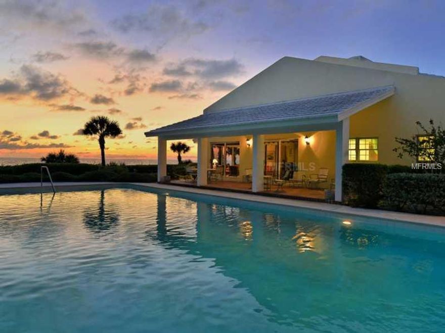 Built in 1977, this two-story north Manasota Key home was one of the first island residences built for year-round living. It sits on a high ridge, affording beautiful views of both the gulf and bay waters. Timeless in its details, the home includes marbleflooring, an abundance of sliding glass doors that allow sea breezes and vistas to permeate the surroundings and a 25' x 50' swimming pool, big enough to swim laps. Manicured landscaping has been lovingly cared for. Decks and paved patios abound and provide a wonderful place to enjoy spectacular sunsets. Being sold "As Is"