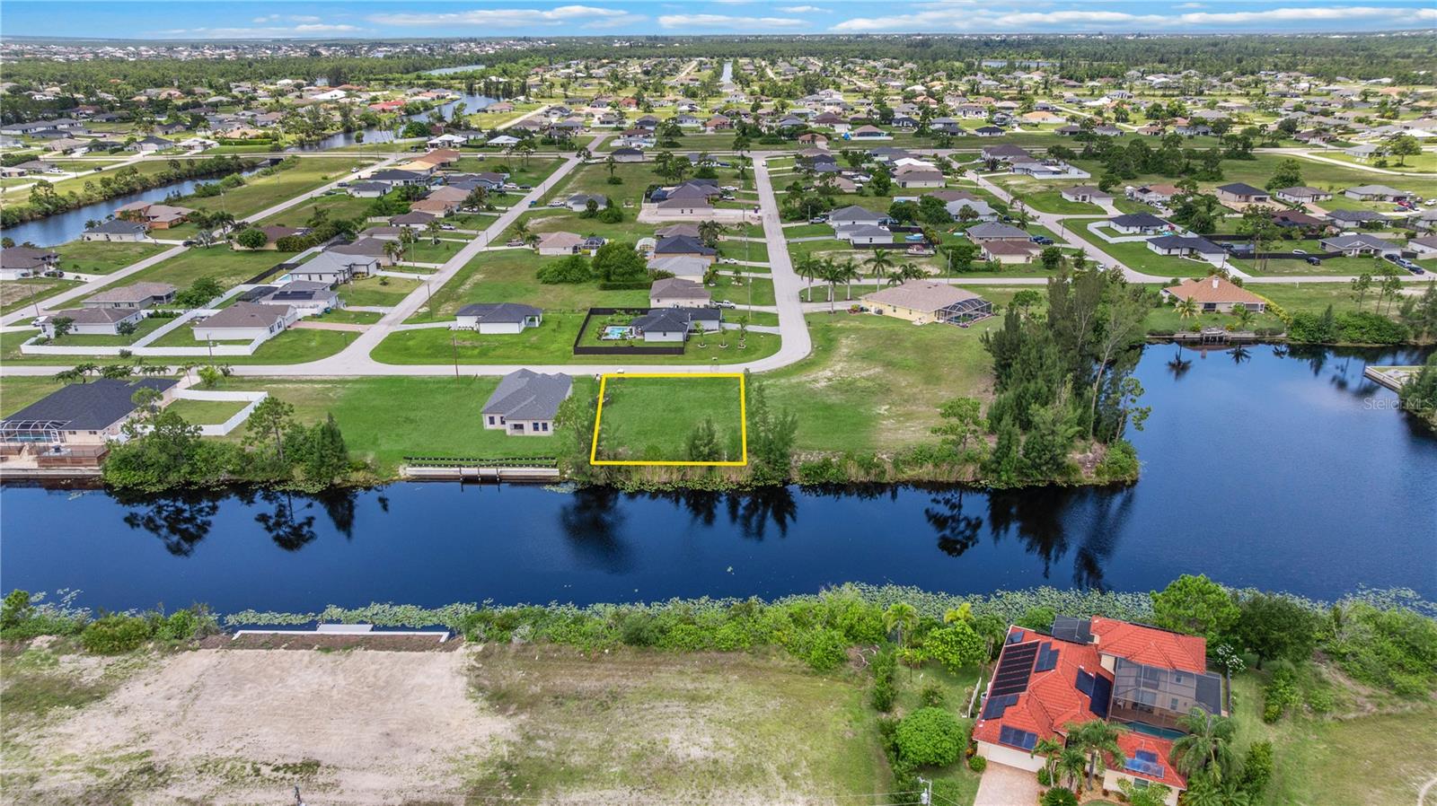 Build your dream home on this beautiful freshwater canal lot located in the fast-growing NW Cape Coral area! This 0.23-acre parcel offers stunning water views and access to miles of freshwater canals and nearby lakes—perfect for kayaking, fishing, or enjoying the peaceful Florida lifestyle. Situated in a quiet residential neighborhood with newer homes, No HOA and no time limit to build, giving you flexibility and freedom. No Environmental issues or endangered species present. No Flood Zone