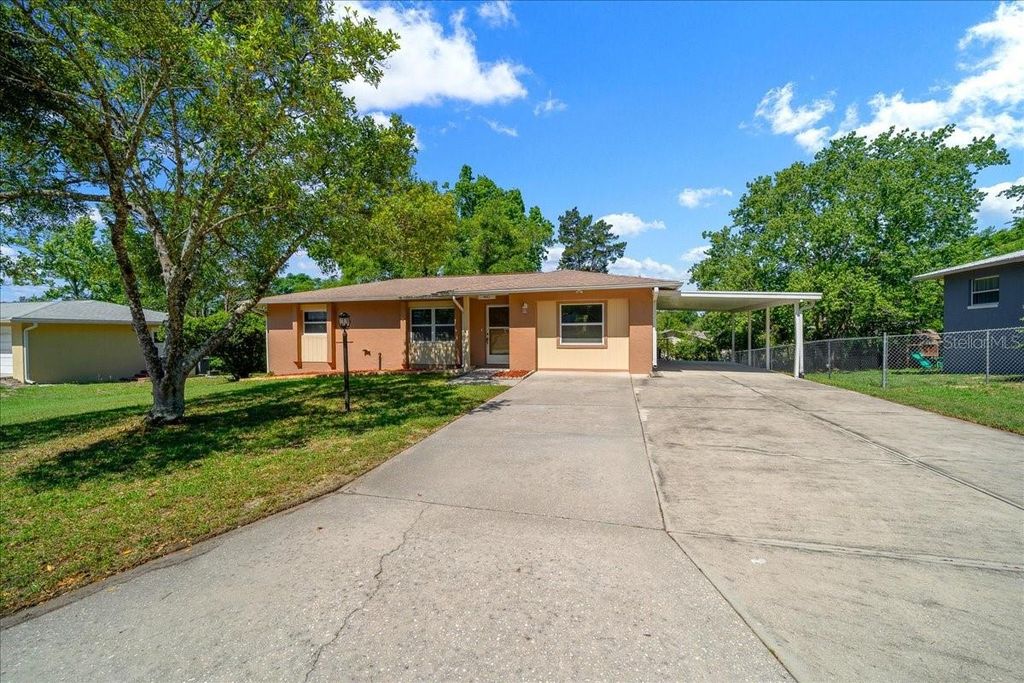 Photo of 410 S Adams Street, Beverly Hills, FL 34465 (MLS # OM723054)